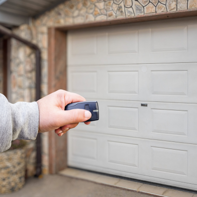 Colorado Springs security key fob pointing to a garage door